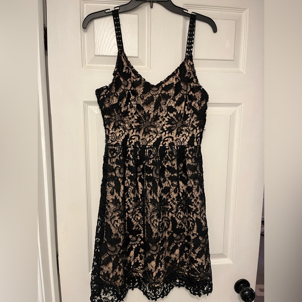 Black lace dress made by She-Sky. Size Large NWT